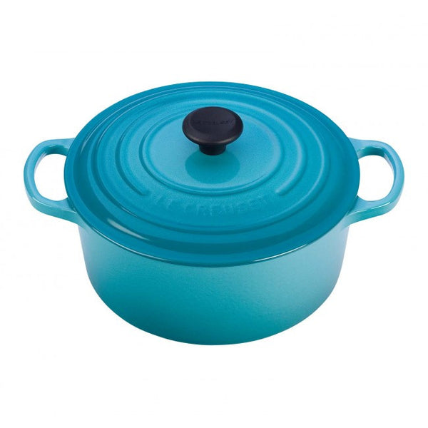 https://www.mytoque.com/cdn/shop/products/le-creuset-4-5-qt-round-french-oven-caribbean-enameled-cast-iron-cookware-335_600x.jpeg?v=1694491990